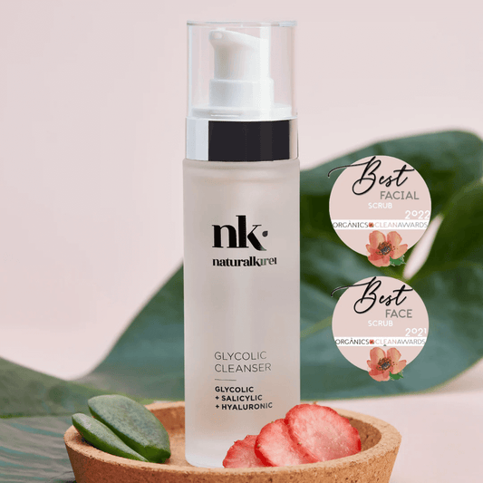 NK Glycolic Cleanser, an organic skincare product, award-winning for best facial scrub, featuring glycolic, salicylic, and hyaluronic acids.